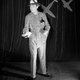 A male model wears a checkered “Siren Suit,” designed for use during a blackout, at a fashion show in New York in 1942